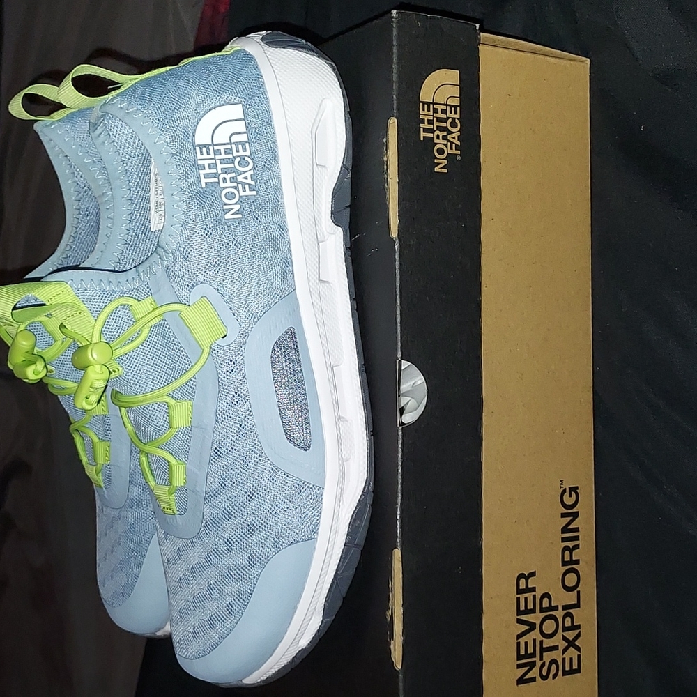 Size 8 North Face Beta Blue,white and sharp green shoe laces water sneakers.
